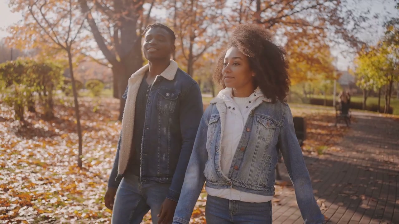Young Couple Enjoying Autumn Walk