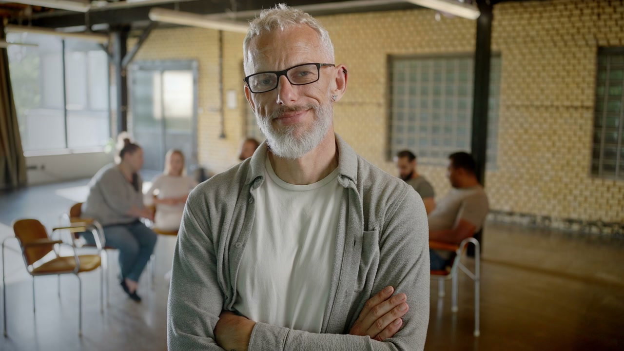 Smiling Therapist at Group Session