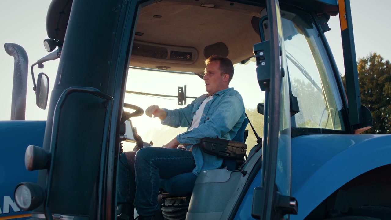 Tractor Driver Resting in Cab