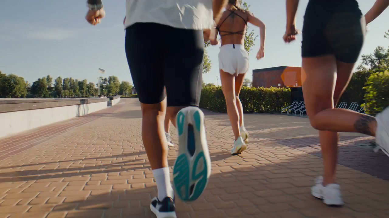 Diverse Group Running with Prosthetic Leg