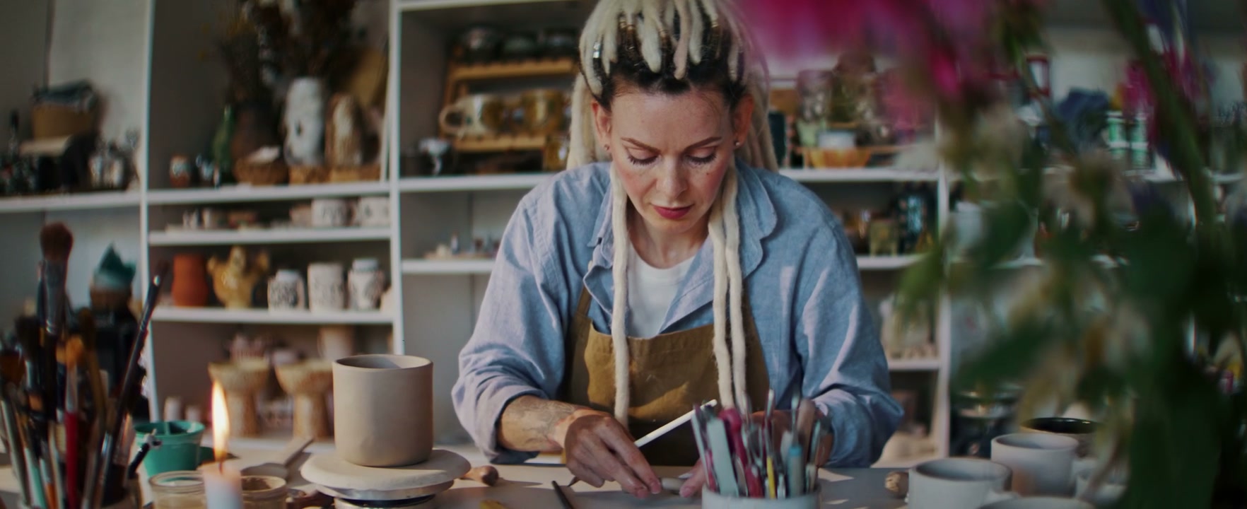 Ceramic Artist Working With Clay