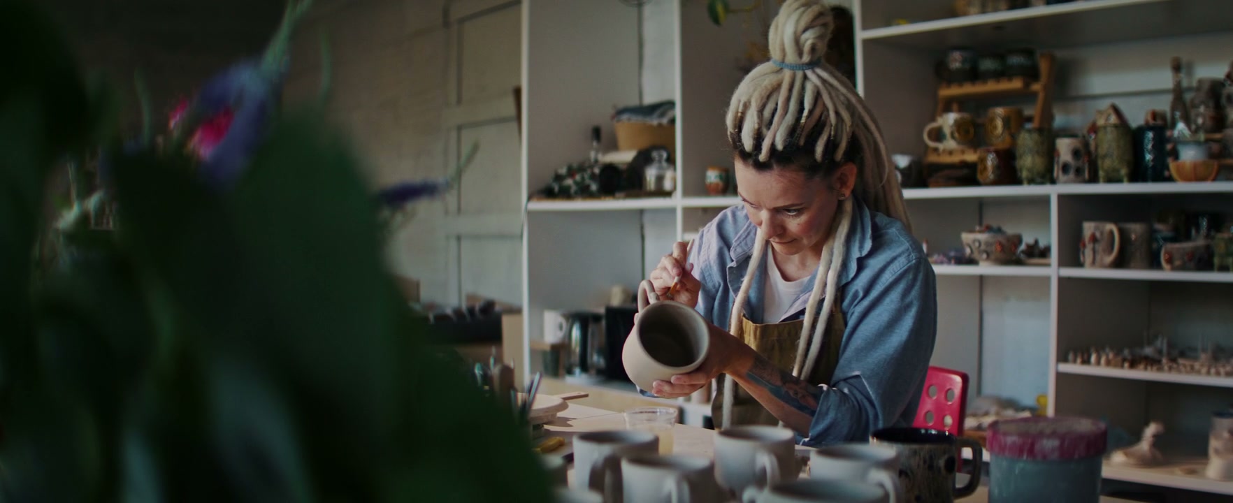 Potter Hand Painting Ceramic Mug