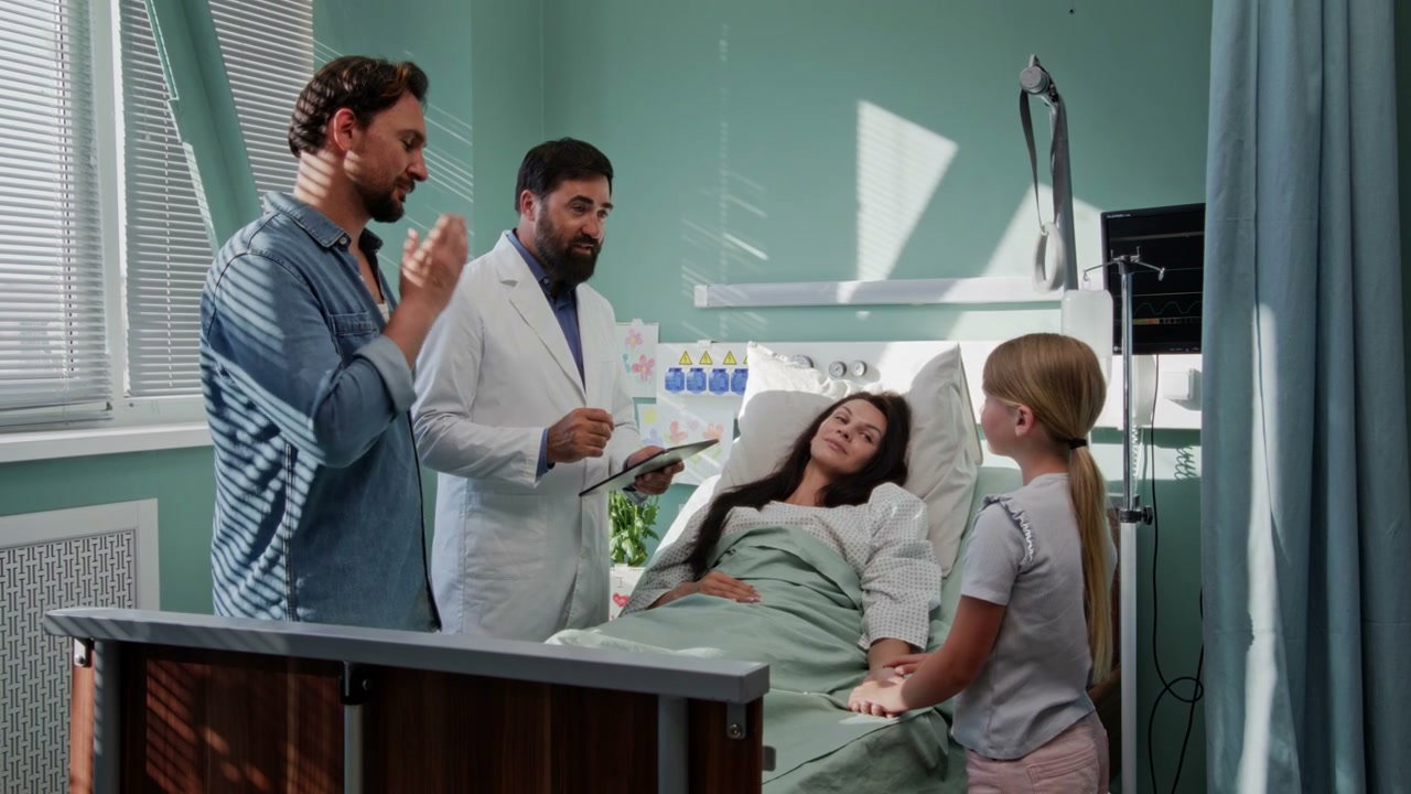 Doctor Explaining to Family in Hospital