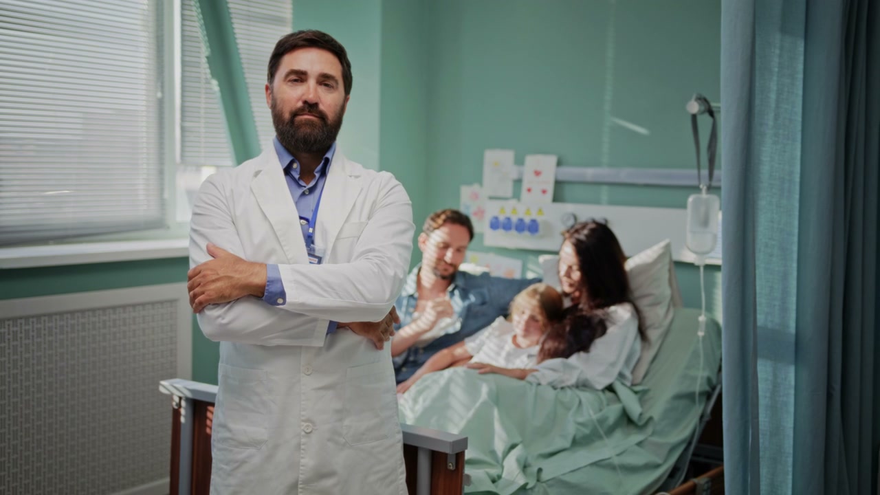 Doctor with Family in Hospital Room