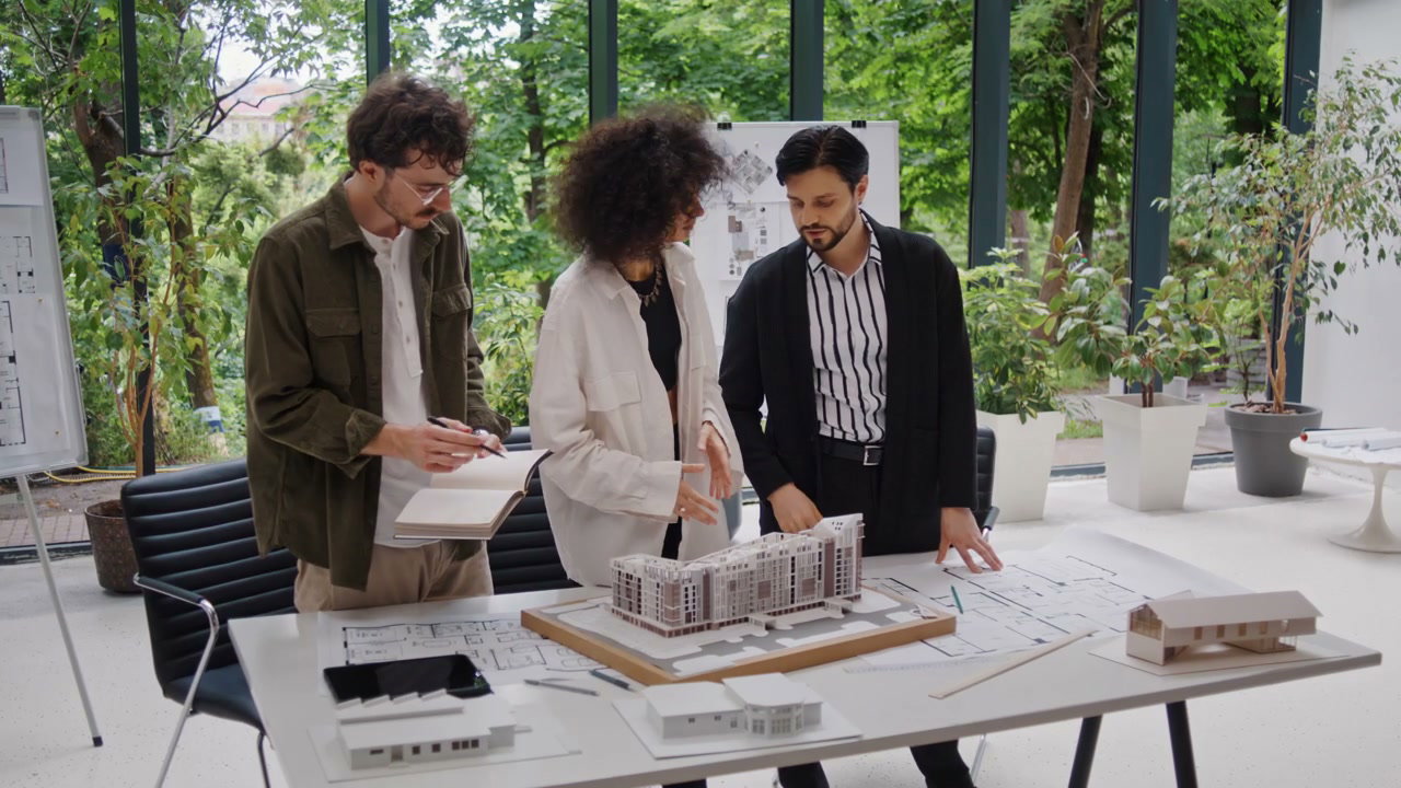 Architects Collaborating on Building Model