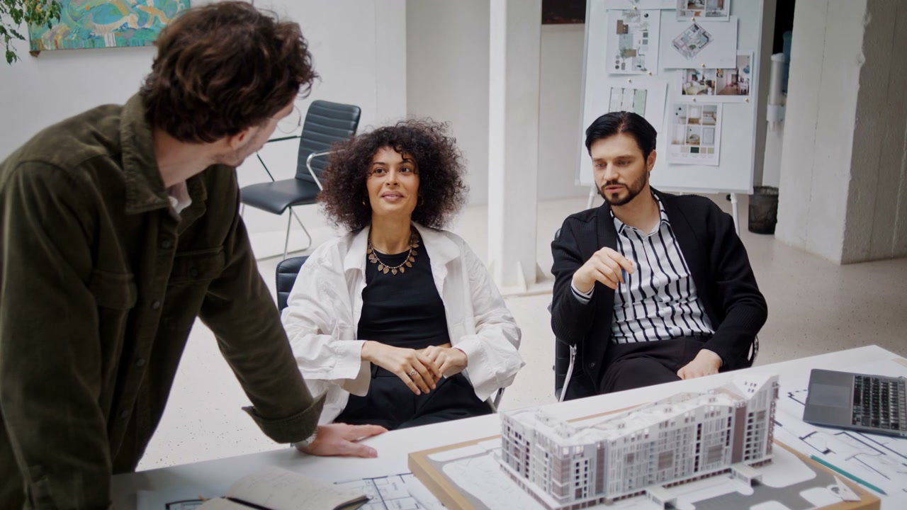 Colleagues Discussing Architectural Design