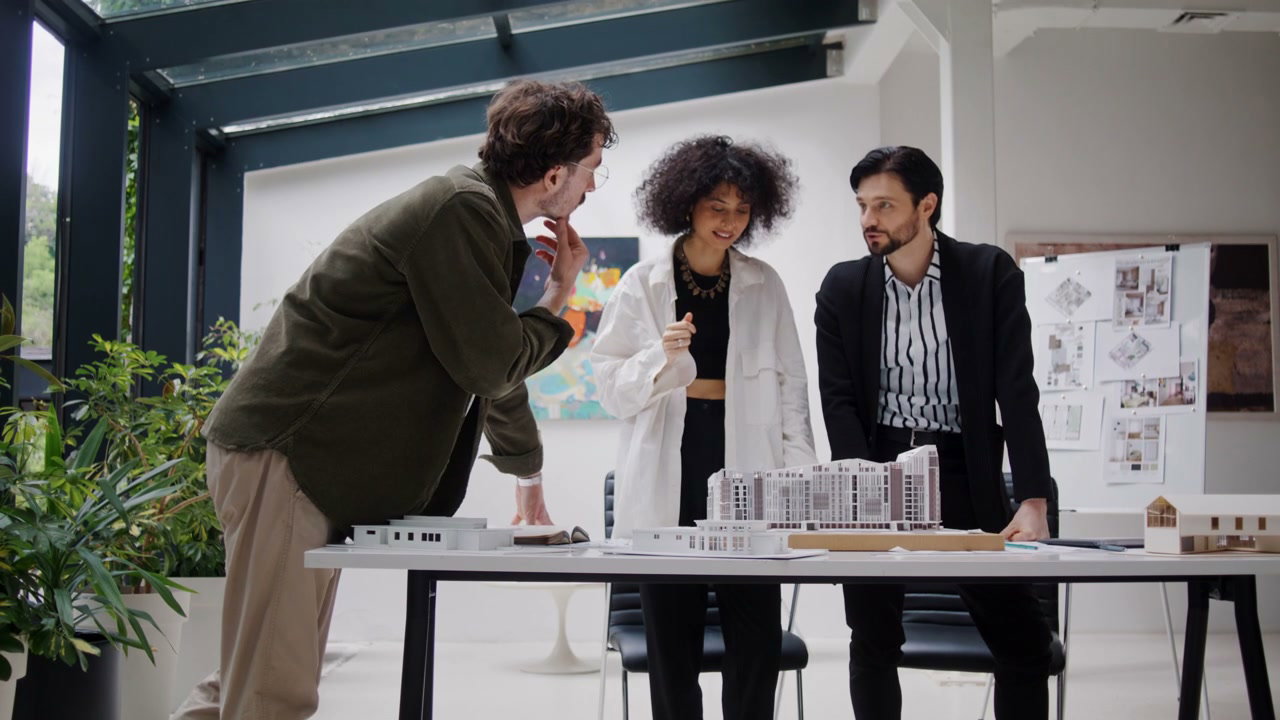 Architects Discussing Building Model