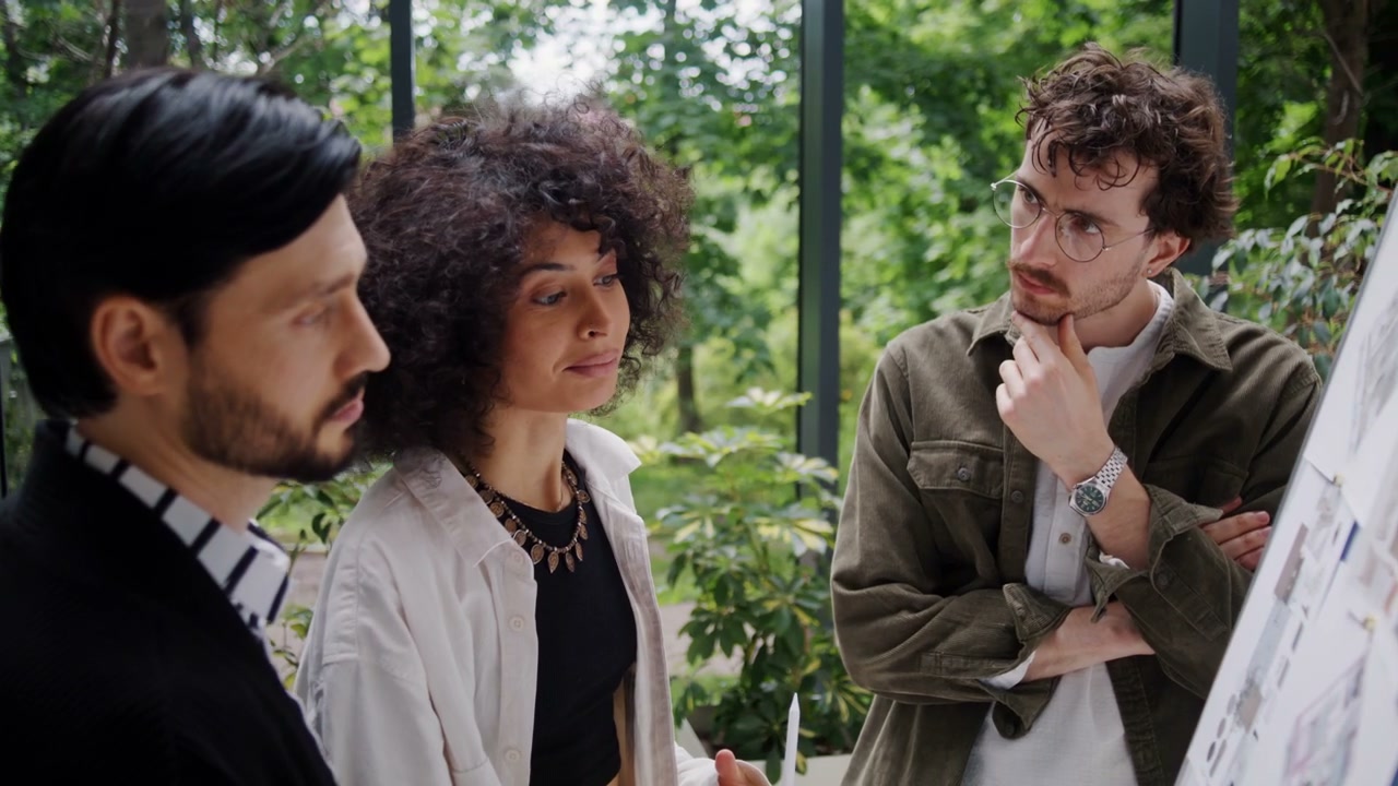 Creative Team Discussing Architectural Plans