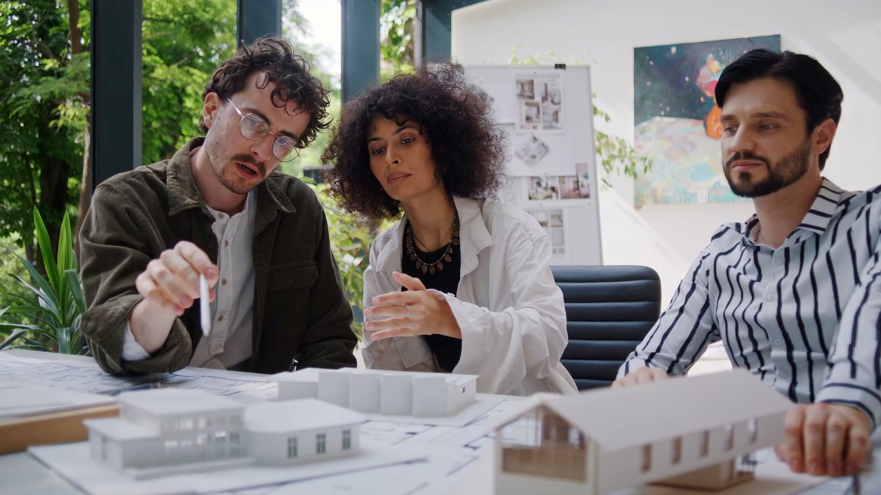Architects Discussing Building Models