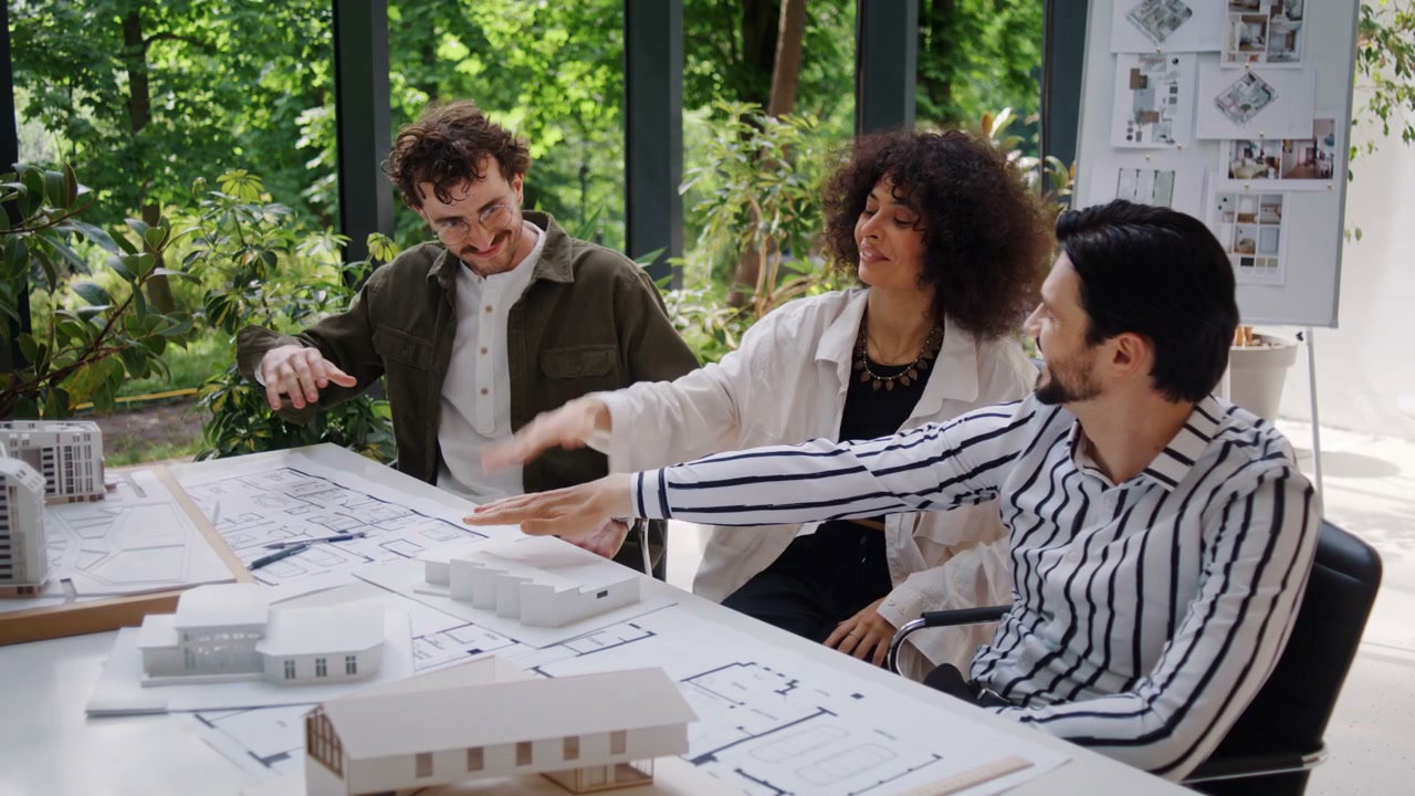 Architects Team Stacking Hands in Office