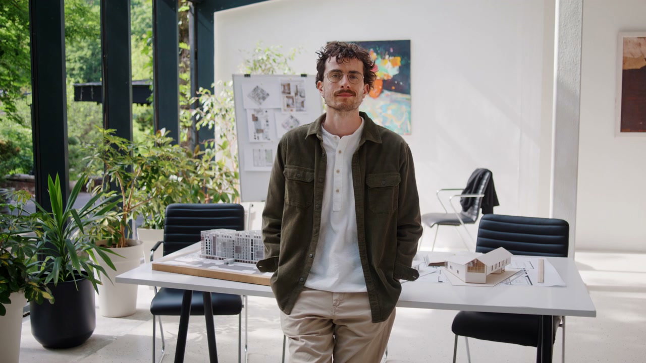 Young Architect Posing in Design Studio