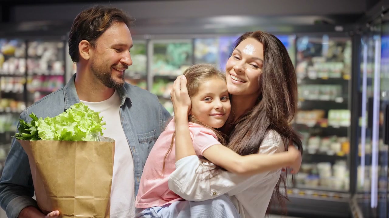 Happy Family Posing in a Grocery Store