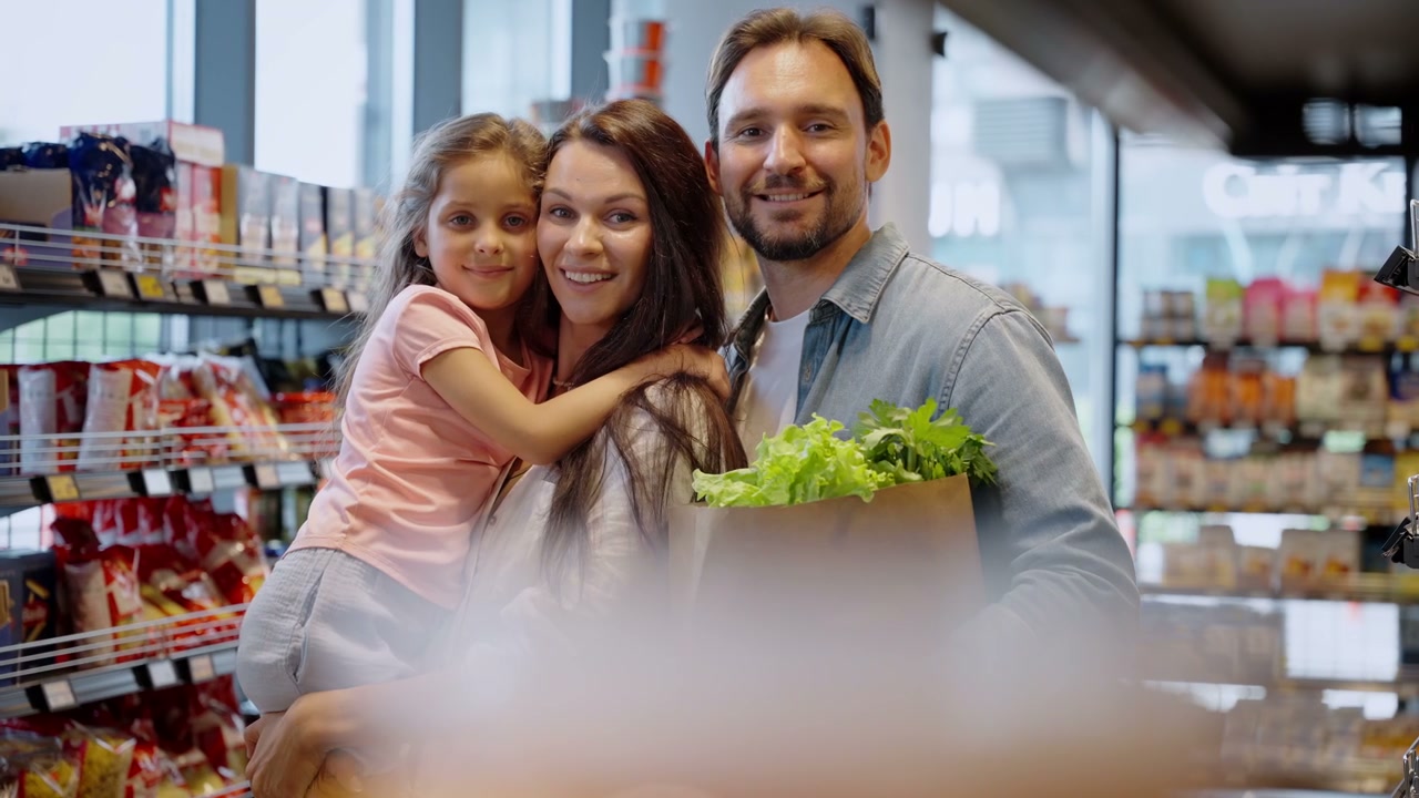 Happy Family Posing in Supermarket