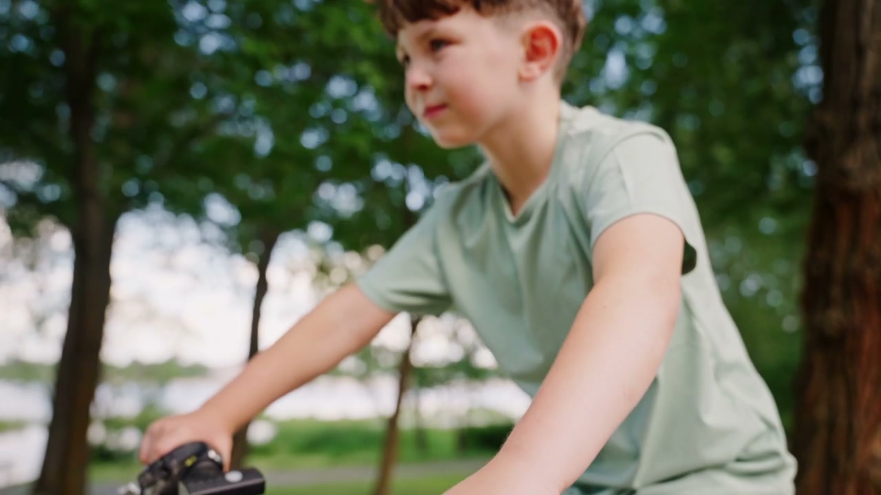 Boy on Bike in Park
