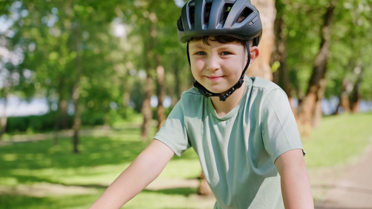 Boy in Helmet Smiling in Park