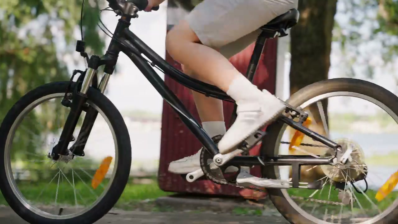 Young Boy Cycling in a Park