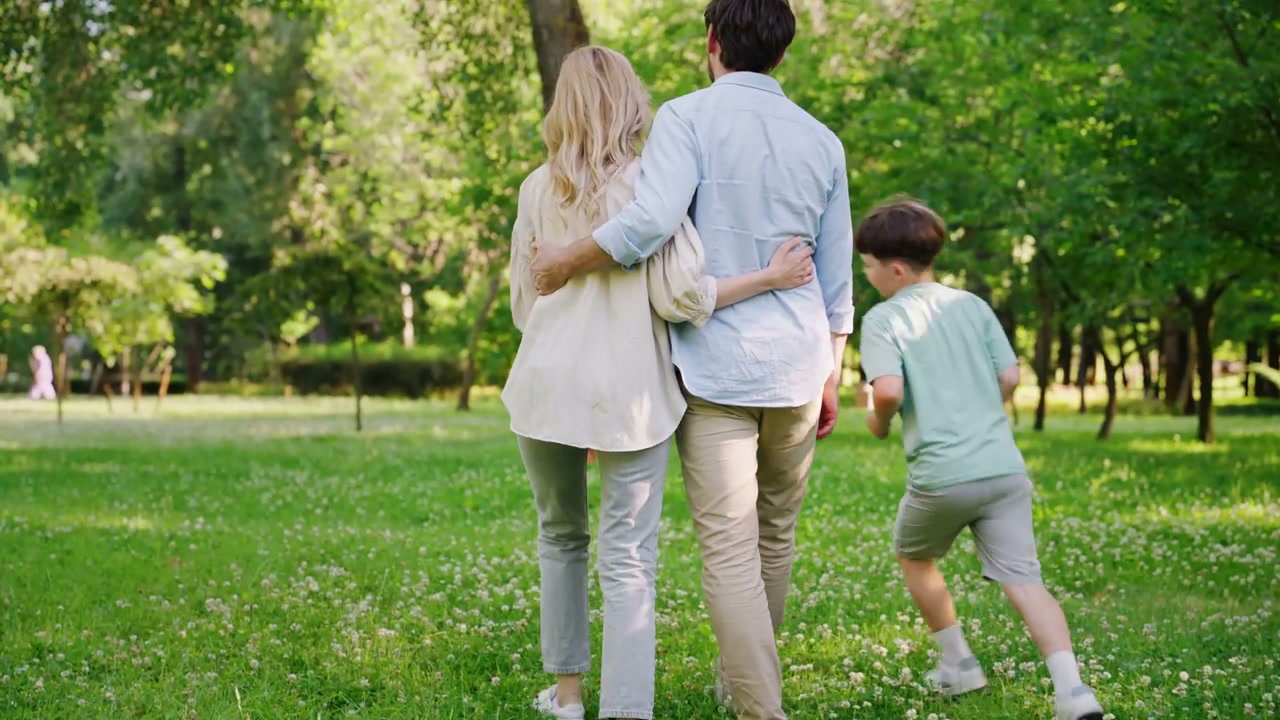 Family Walking Together in a Park