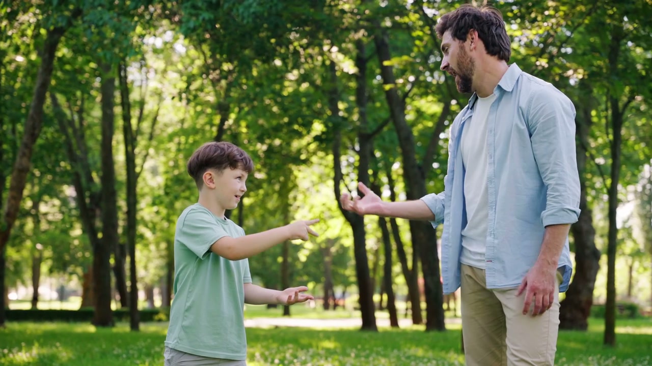 Father and Son Play Rock Paper Scissors Game
