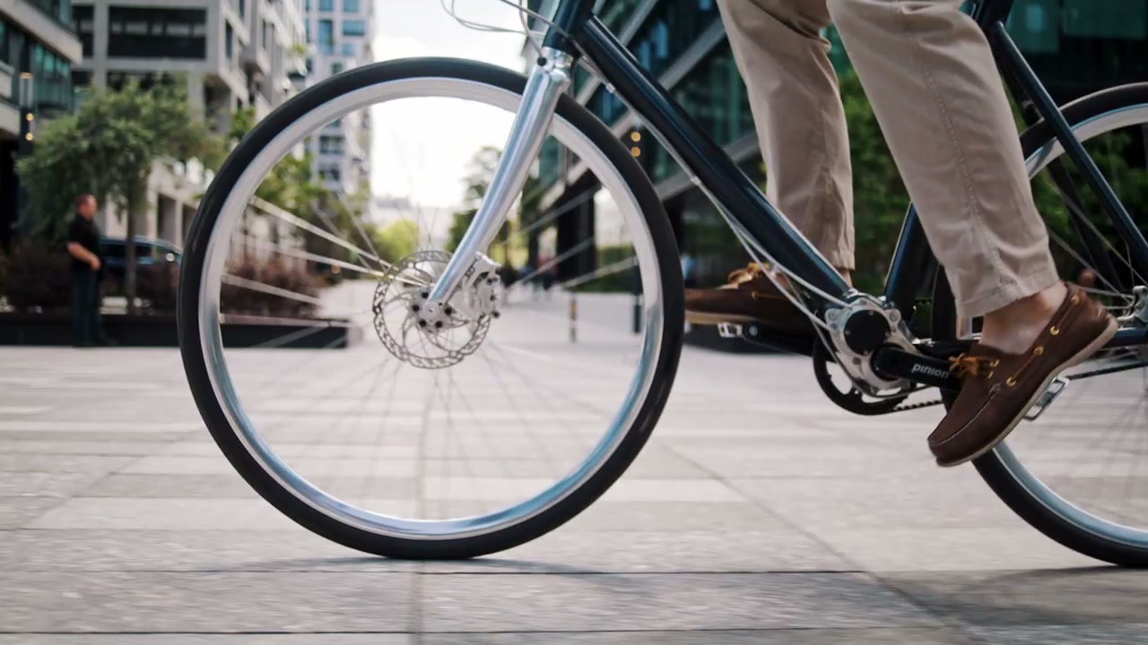 Person Cycling Bike in Urban City