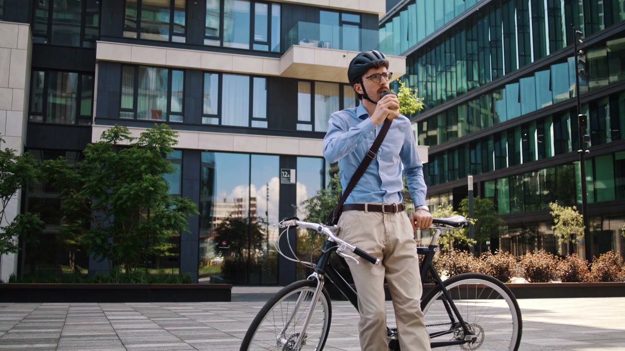 Businessman with Bike Drinking Coffee