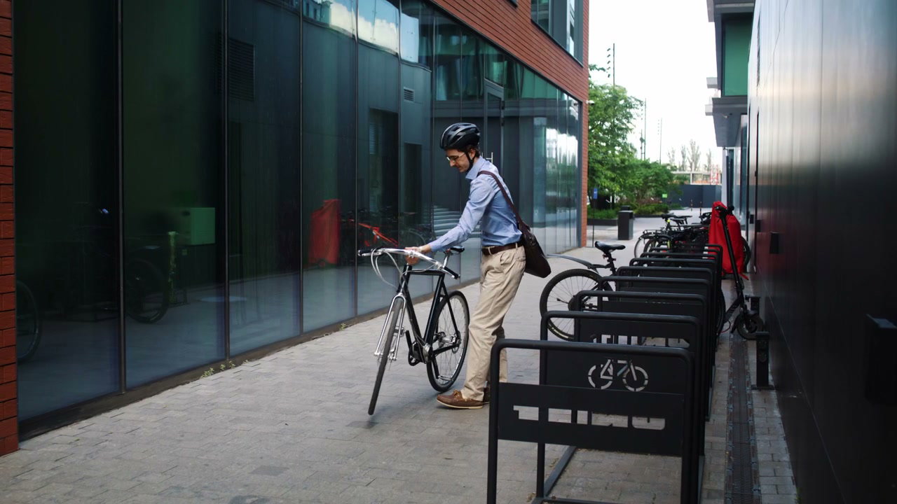 Businessman Riding Bike in City