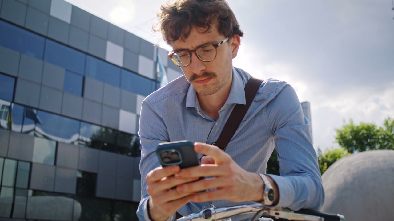 Businessman Using Smartphone Outdoors