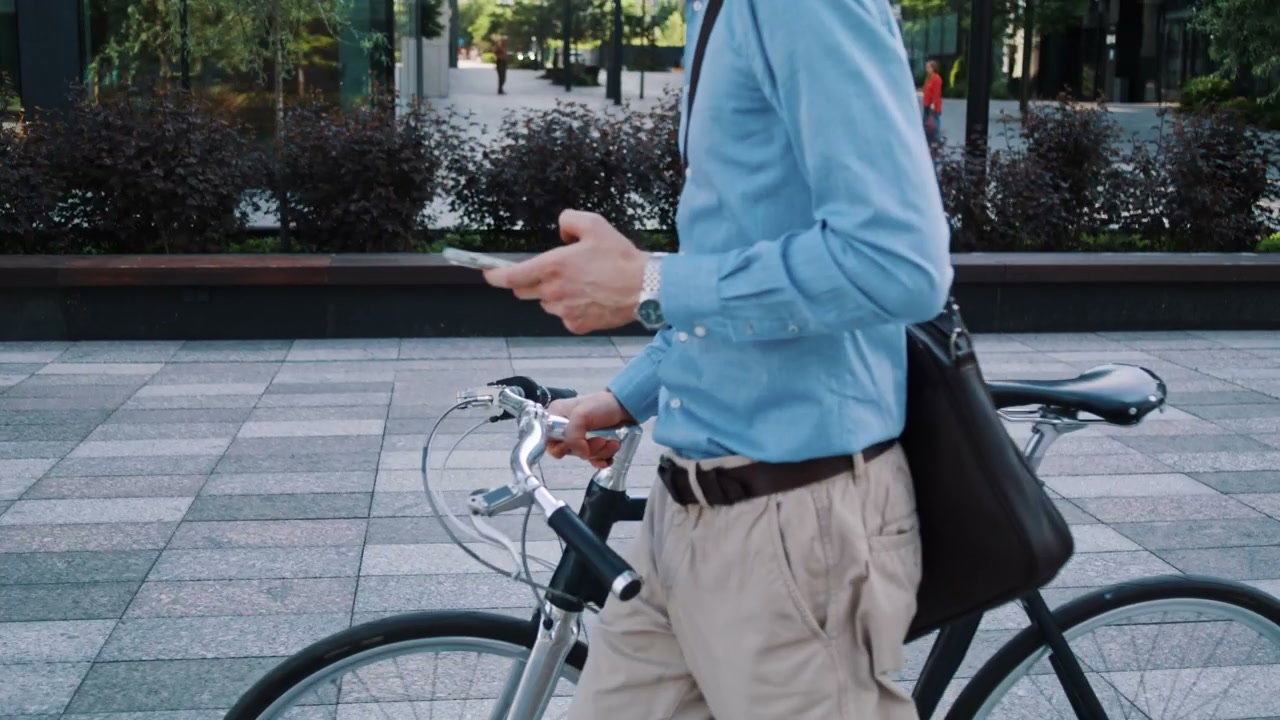 Professional Walking Bike and Checking Phone
