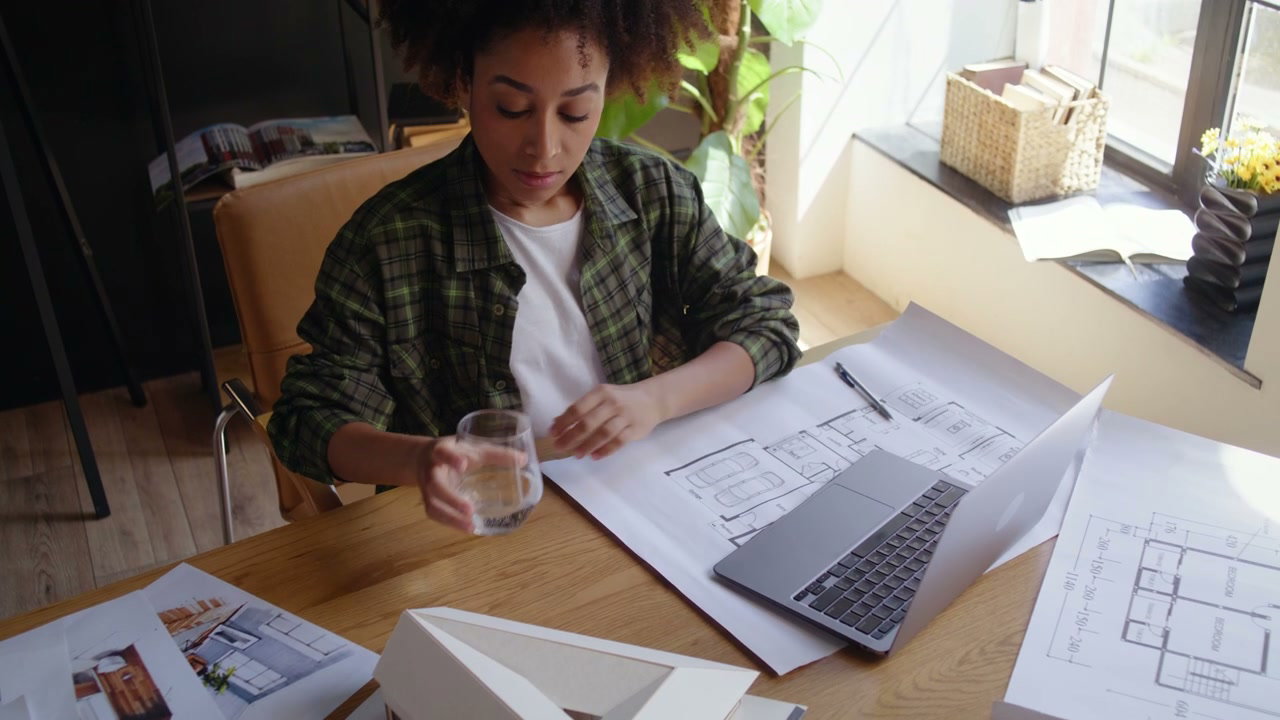 Architect Working on Design Plans