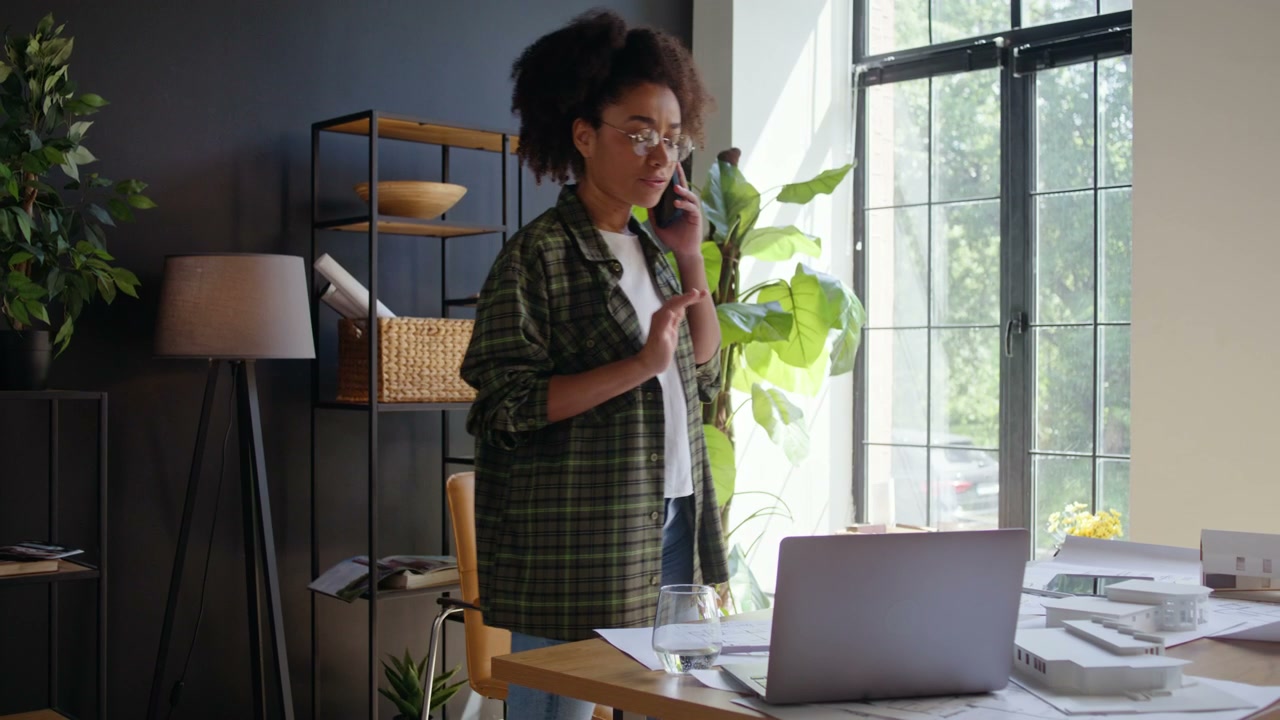 Female Architect On Call In Office