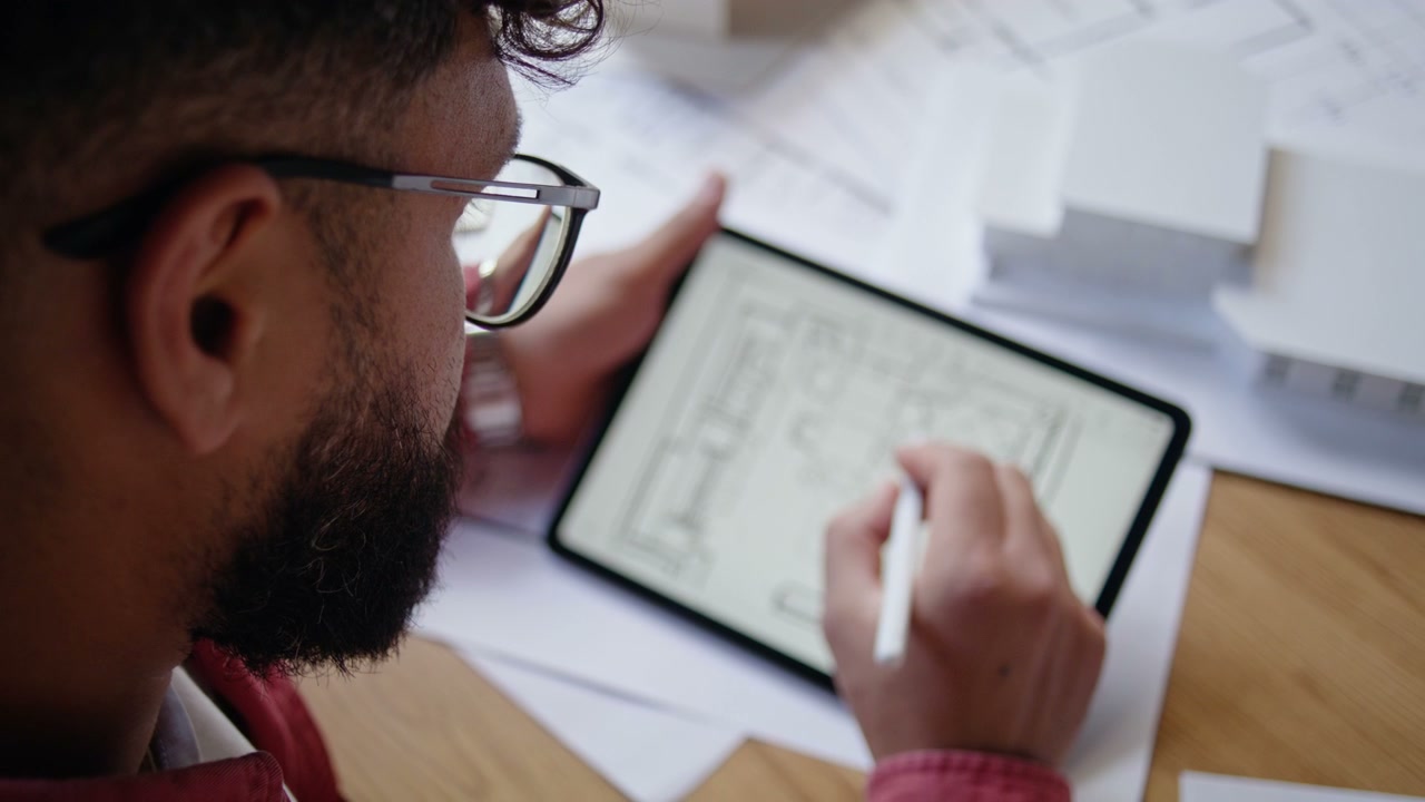 Architect Drawing Floor Plan on Tablet