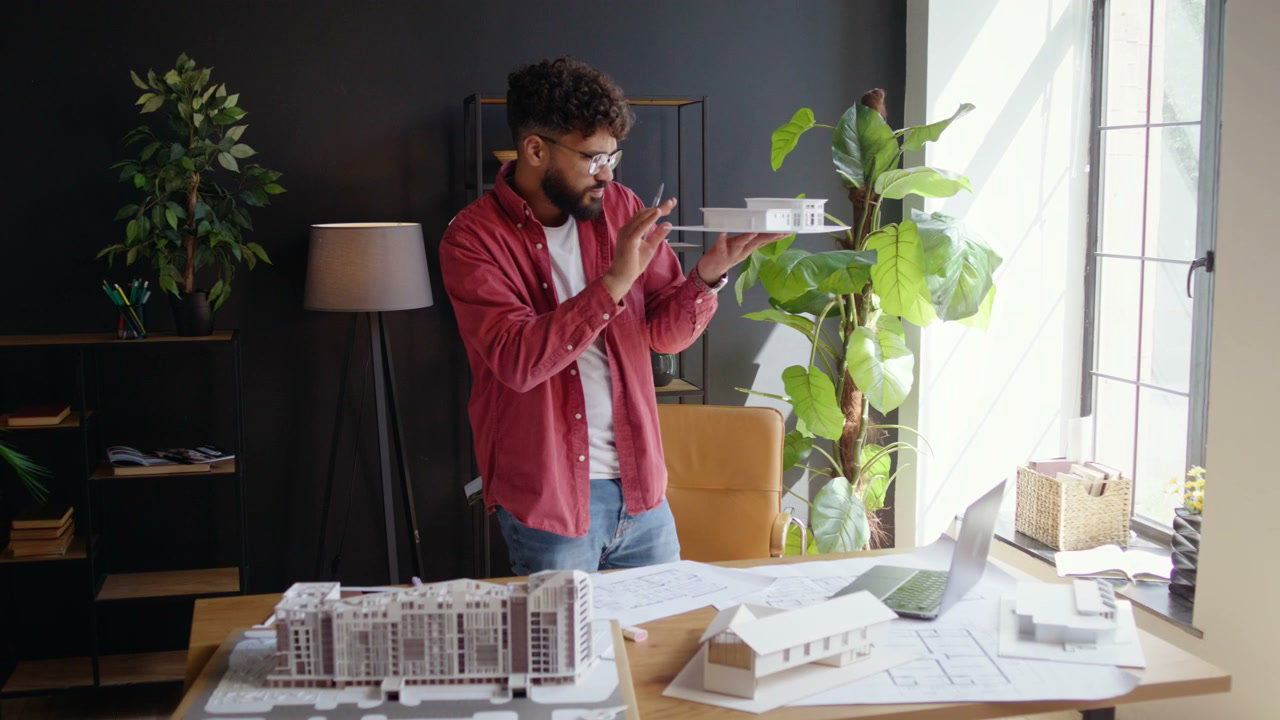 Architect Examining Building Model