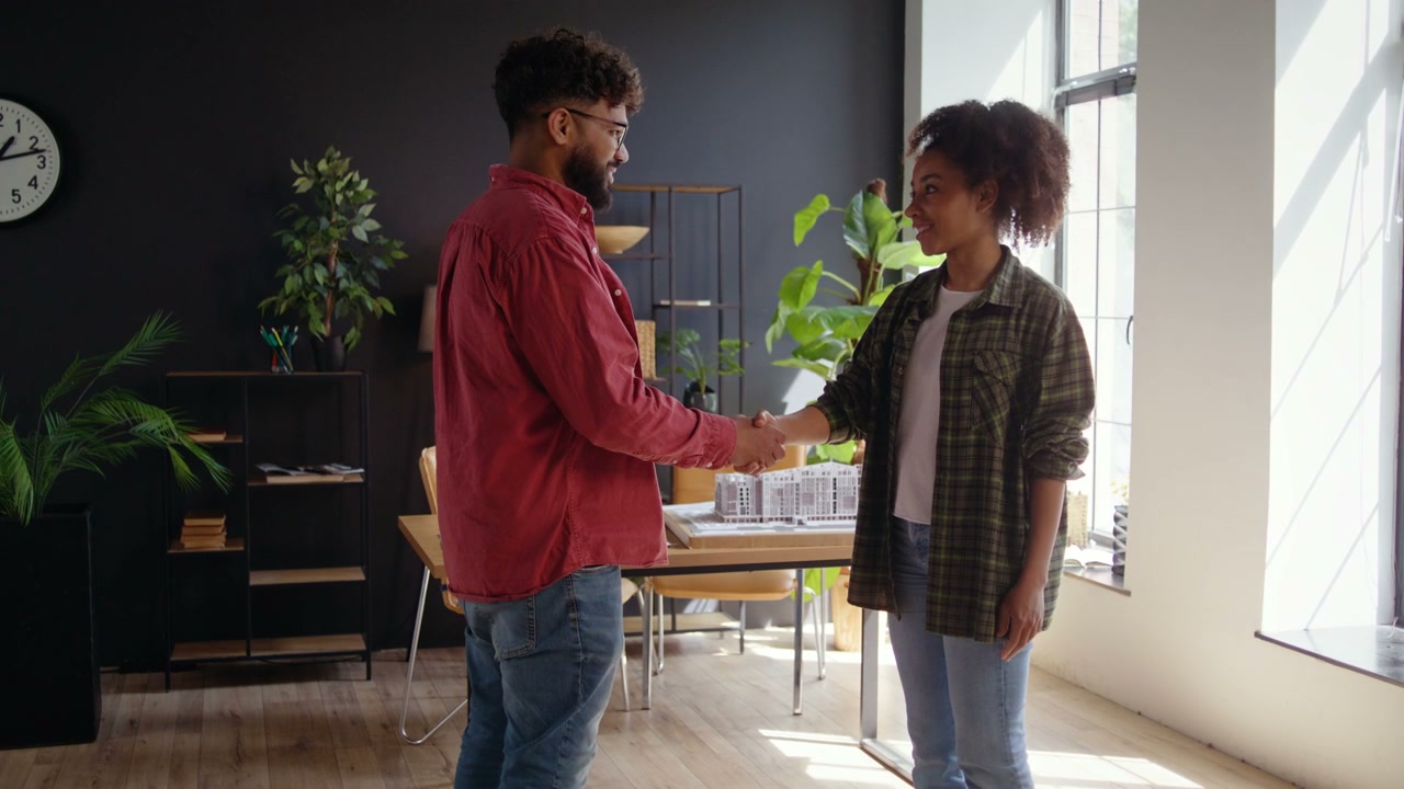 Two Architects Shaking Hands