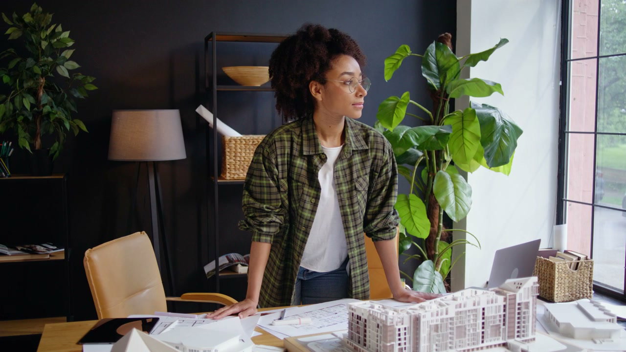 Smiling Architect in Design Studio