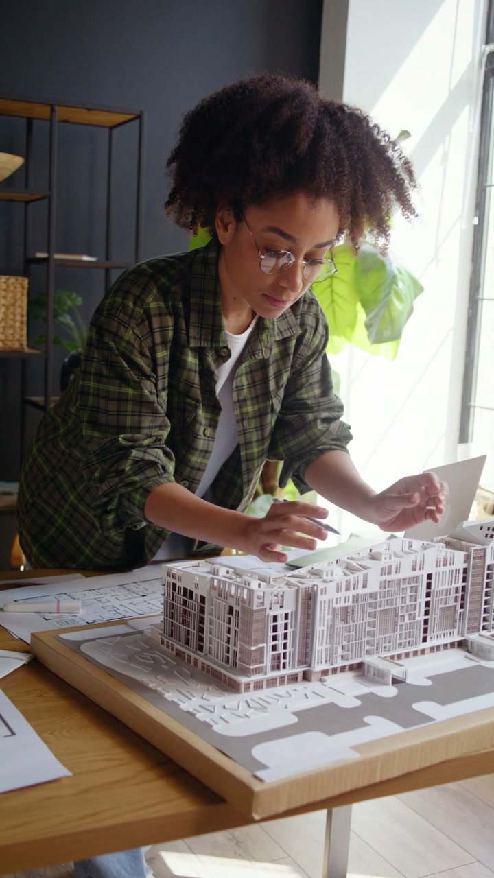 Architect Working on Building Model