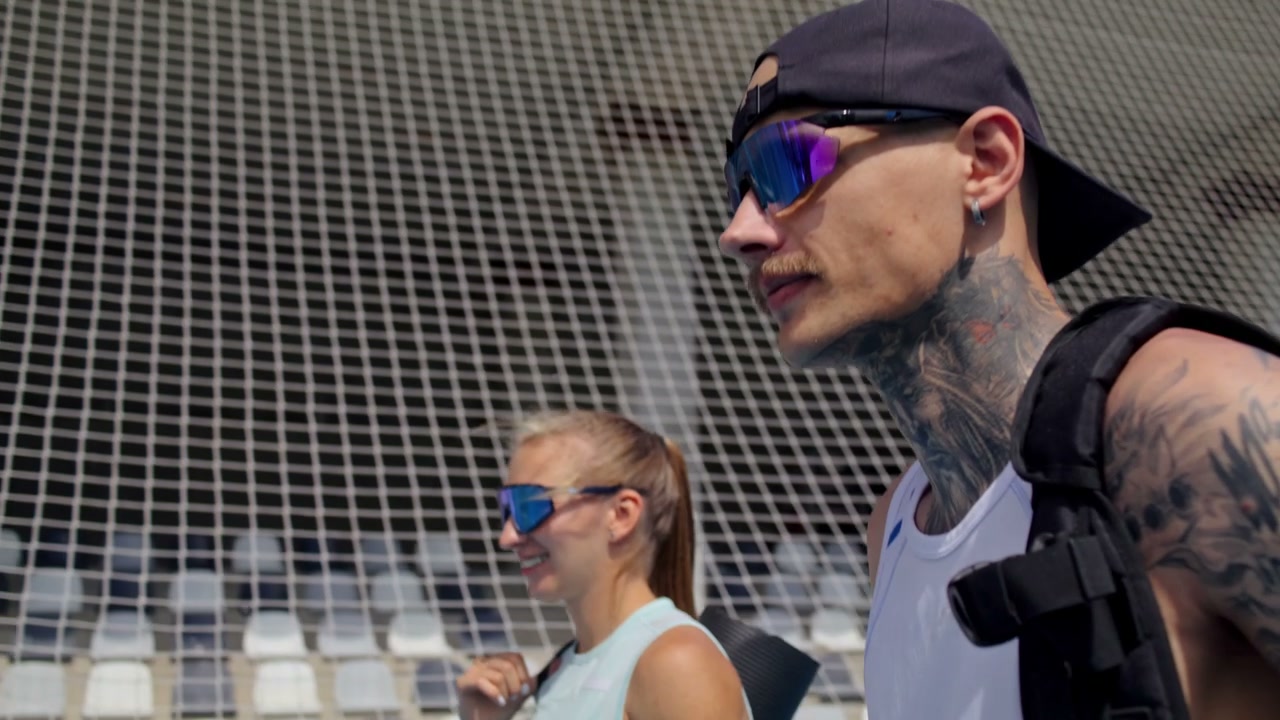 Athletes Walking at Outdoor Sports Stadium
