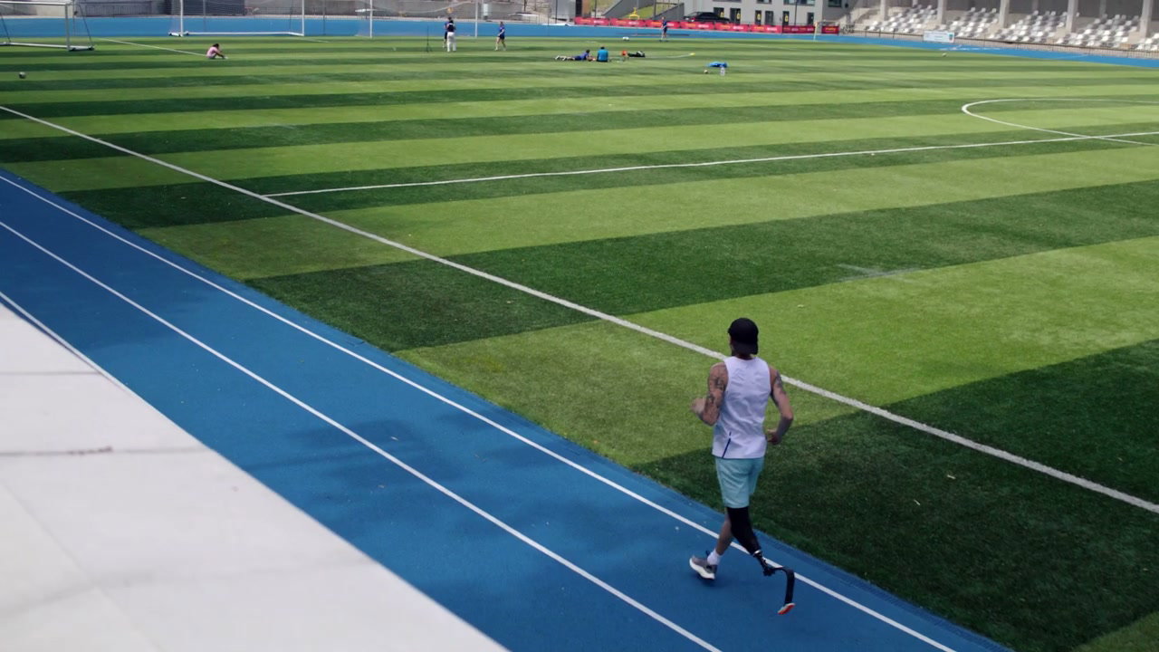 Prosthetic Runner On Stadium Track