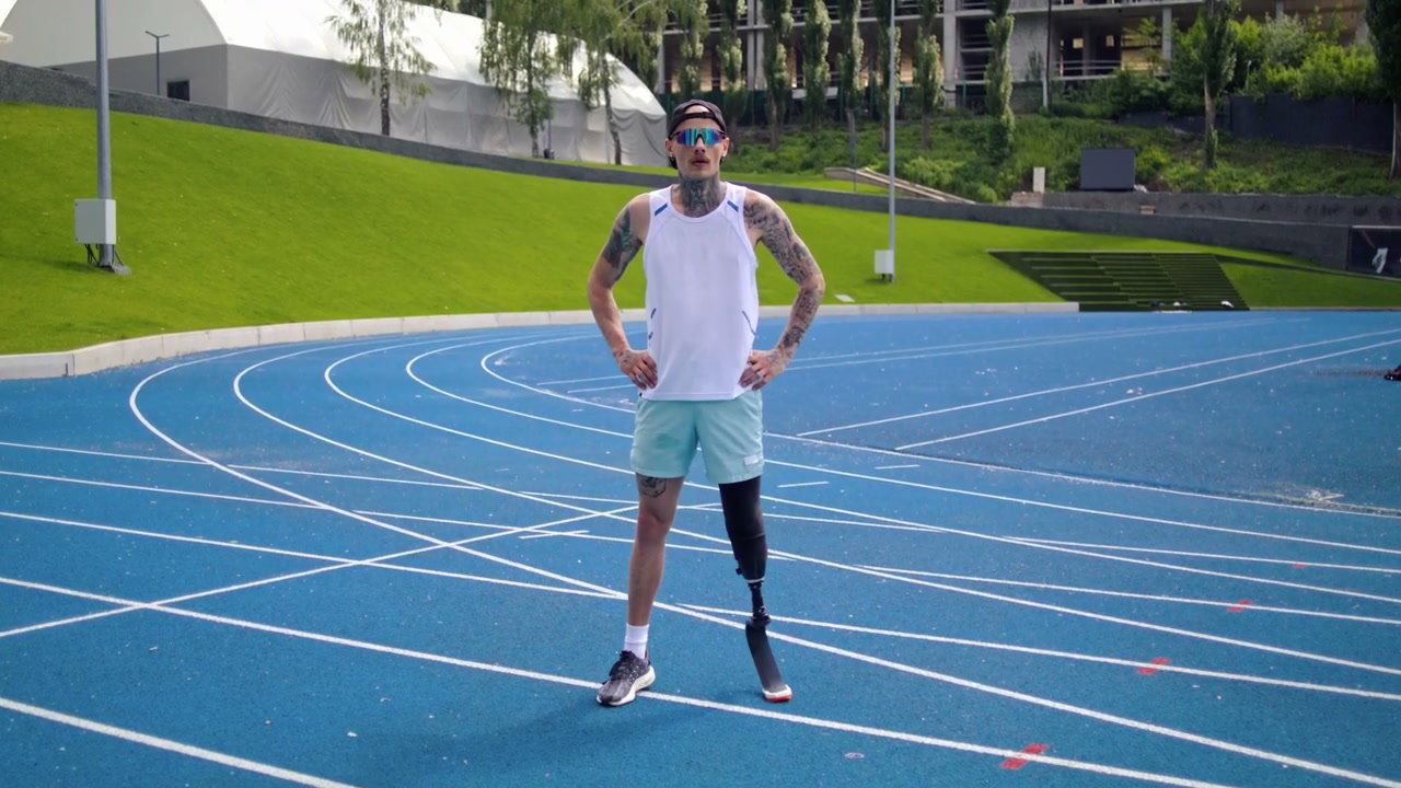 Athlete with Prosthetic Leg on Track