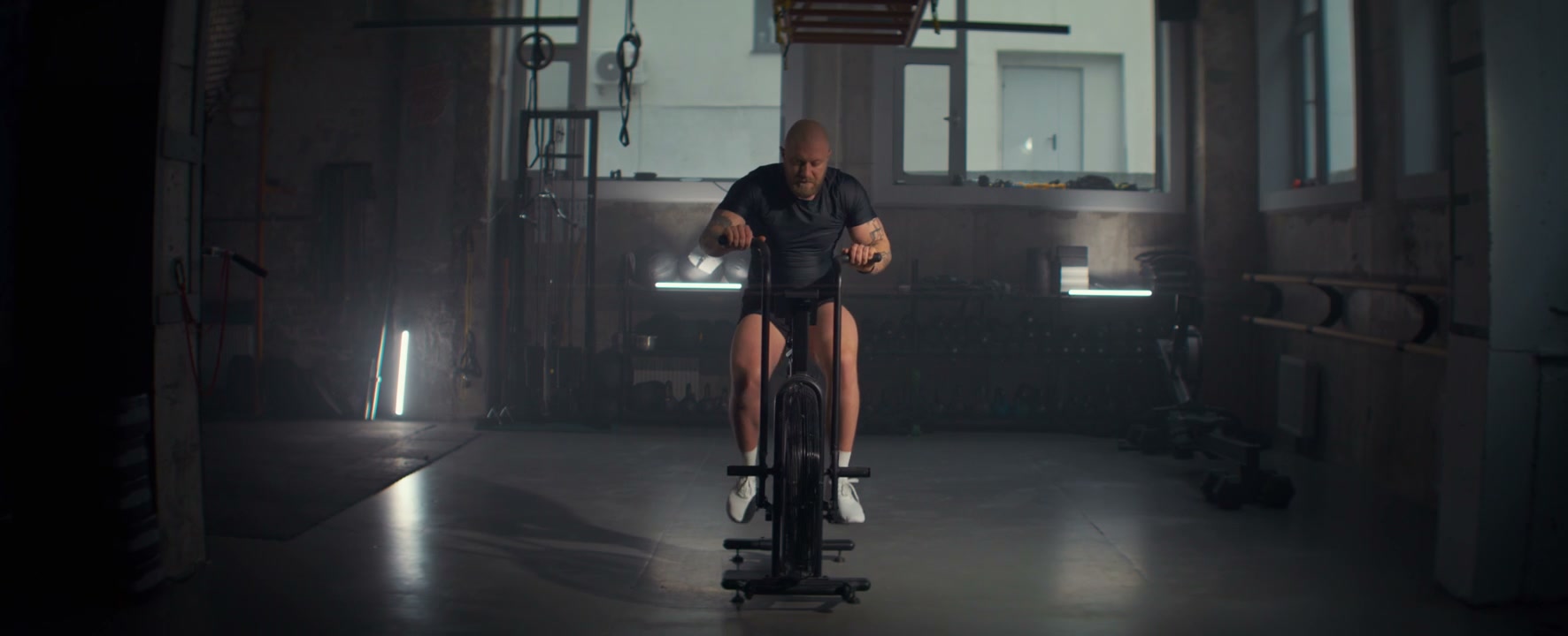 Man Exercising on Stationary Bike