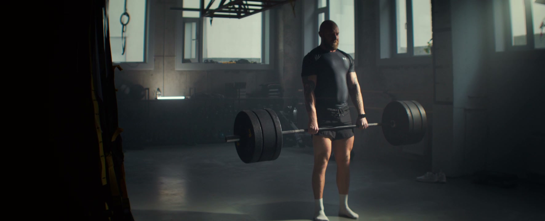 Man Deadlifting In Gym
