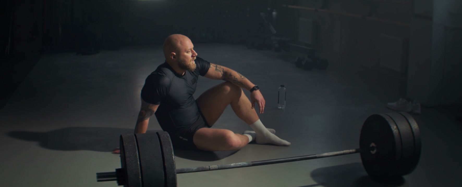 Tired Athlete Resting in a Gym