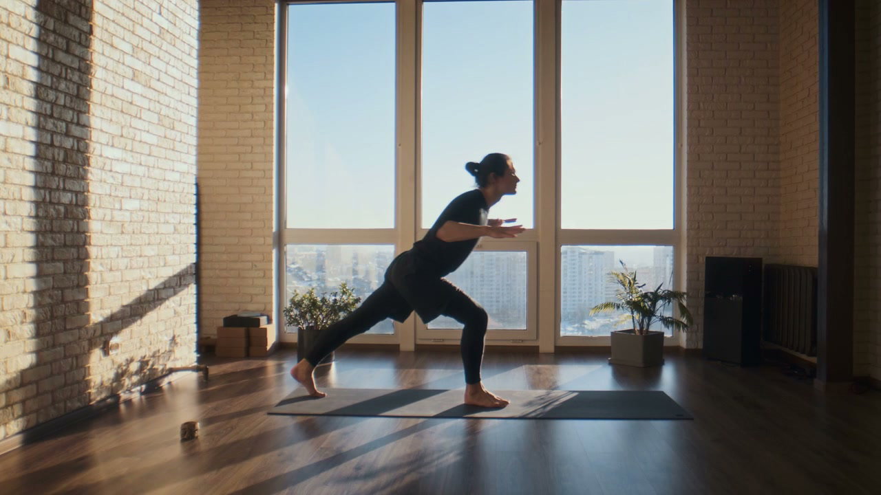 Man Practicing Yoga in Studio