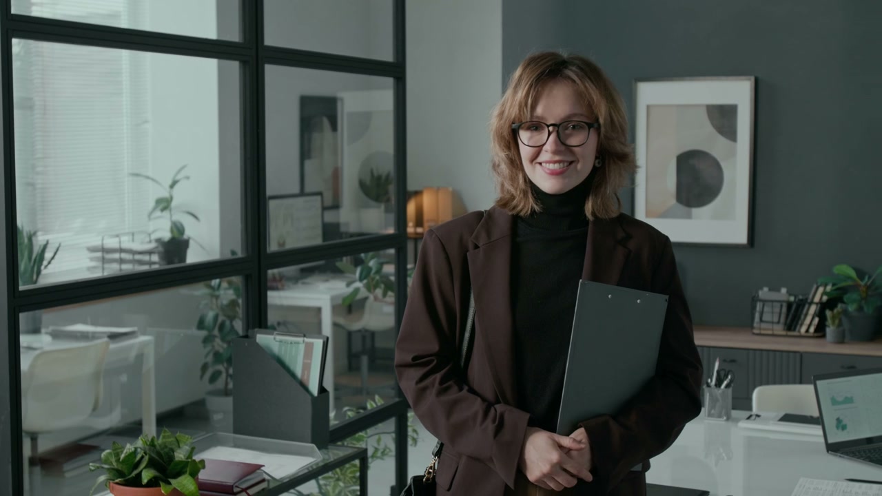 Confident Businesswoman Smiling in Office