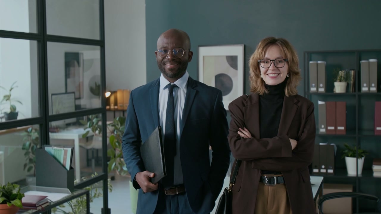 Diverse Colleagues Smiling in Finance Office