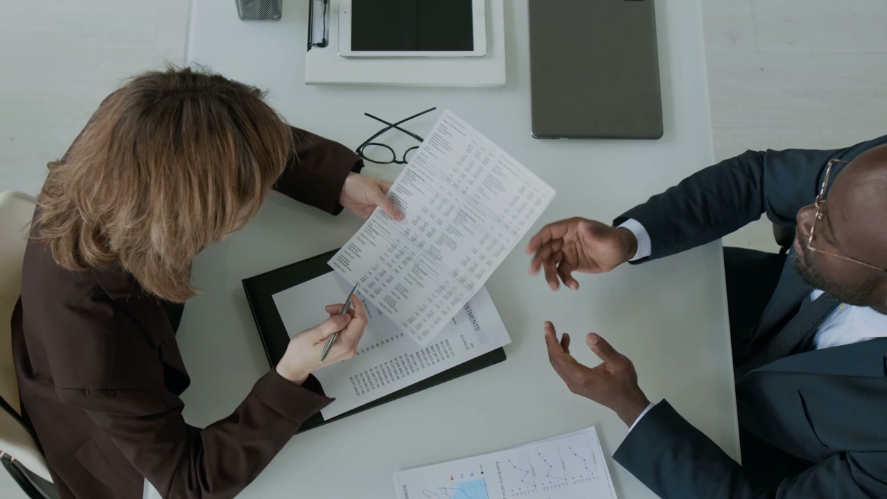 Business Professionals Discussing Documents