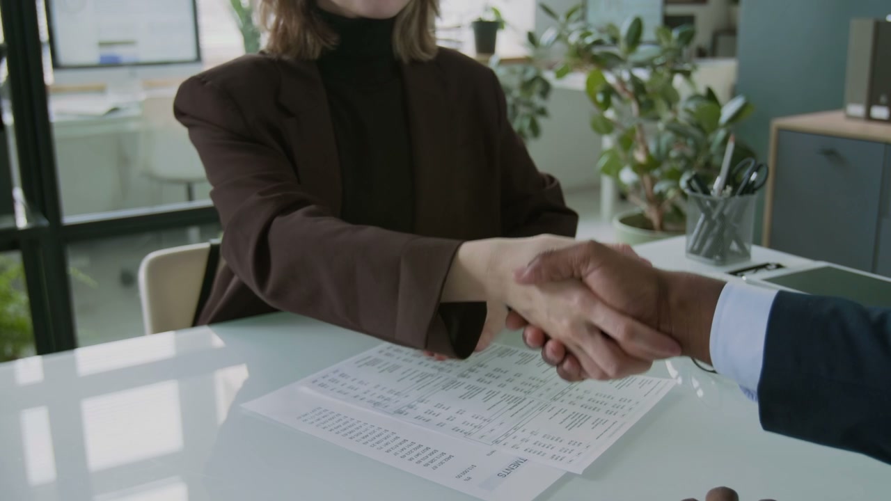 Agreement Handshake in Modern Office