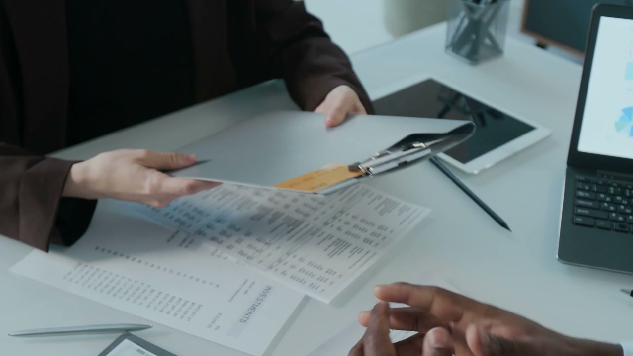 Business Deal Handshake in Finance Office
