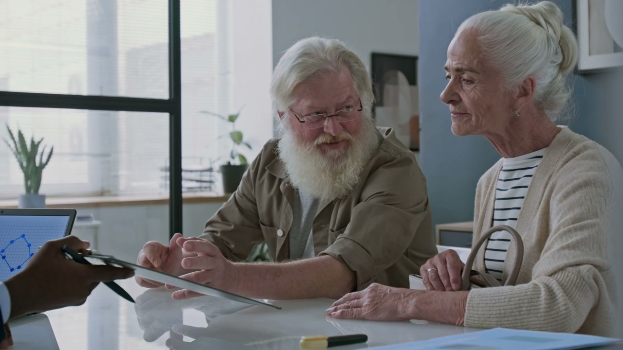 Elderly Couple Meeting Financial Advisor