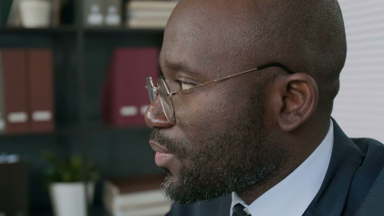 Professional Man Talking in Office