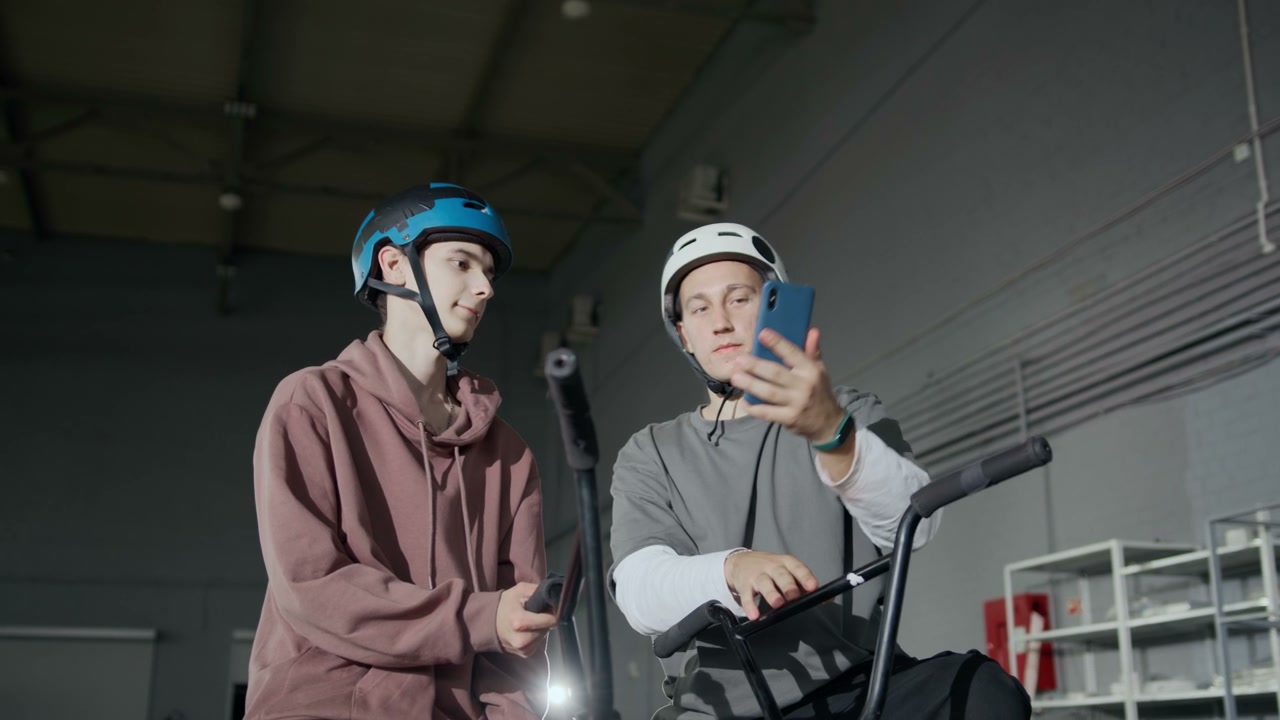 Young Men Taking Selfie at Indoor BMX Park