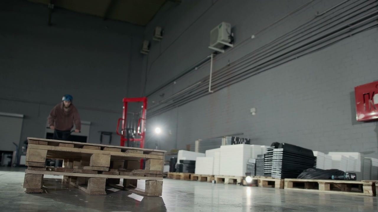 BMX Rider Bunny Hop in Hangar